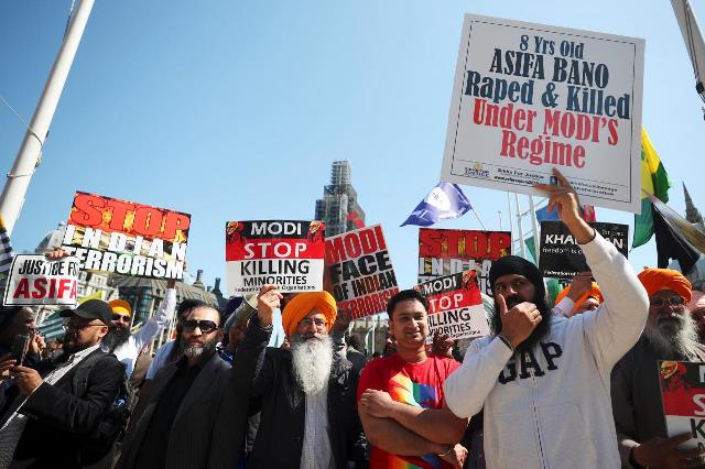 demonstrators stage a protest against the visit by india 039 s prime minister narendra modi in parliament square london britain april 18 2018 photo reuters