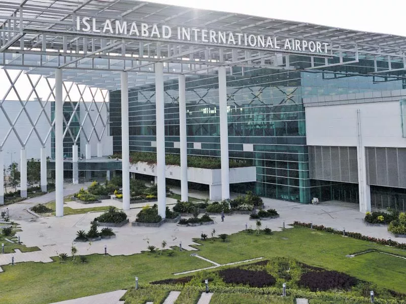 a worker cleans floor at the newly built islamabad international airport photo afp a worker cleans floor at the newly built islamabad international airport photo afp