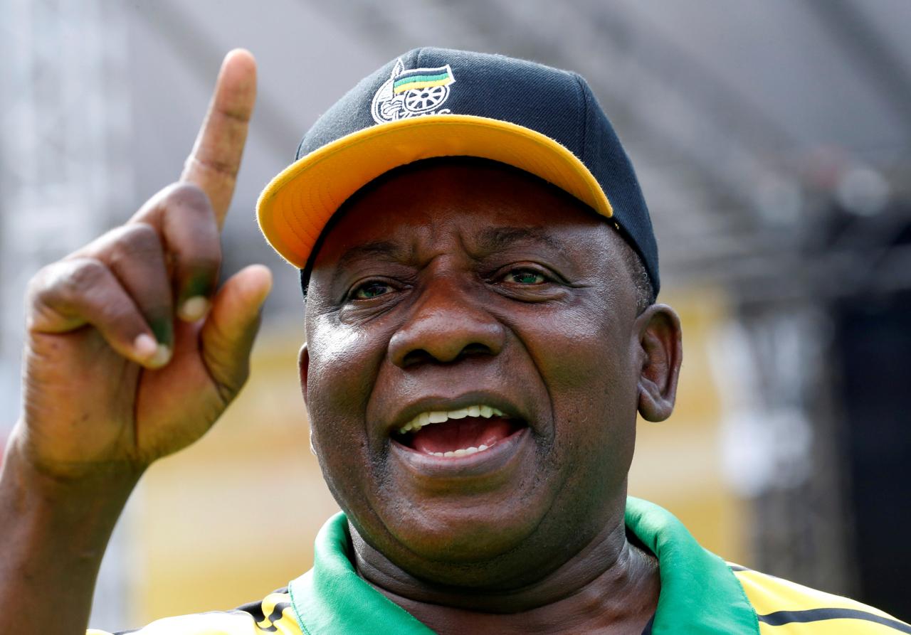 south africa s ramaphosa cuts short britain trip to deal with protests at home