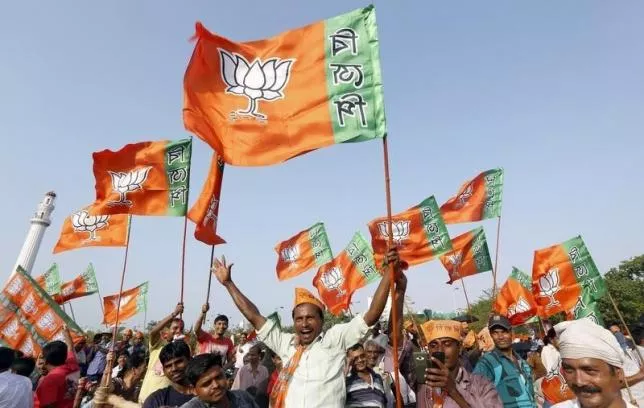 supporters of india 039 s ruling bharatiya janata party bjp wave their party 039 s flags as they wait for prime minister narendra modi to address an election campaign rally in kolkata india april 17 2016 photo reuters supporters of india 039 s ruling bharatiya janata party bjp wave their party 039 s flags as they wait for prime minister narendra modi to address an election campaign rally in kolkata india april 17 2016 photo reuters