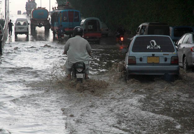 flooded streets in karachi photo express