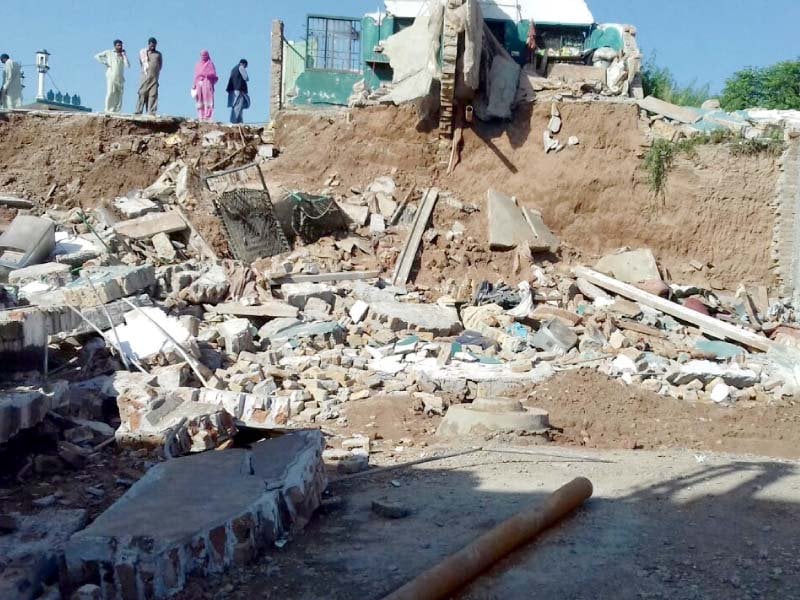 view of the house that caved in due to excavation on the adjacent plot photo express