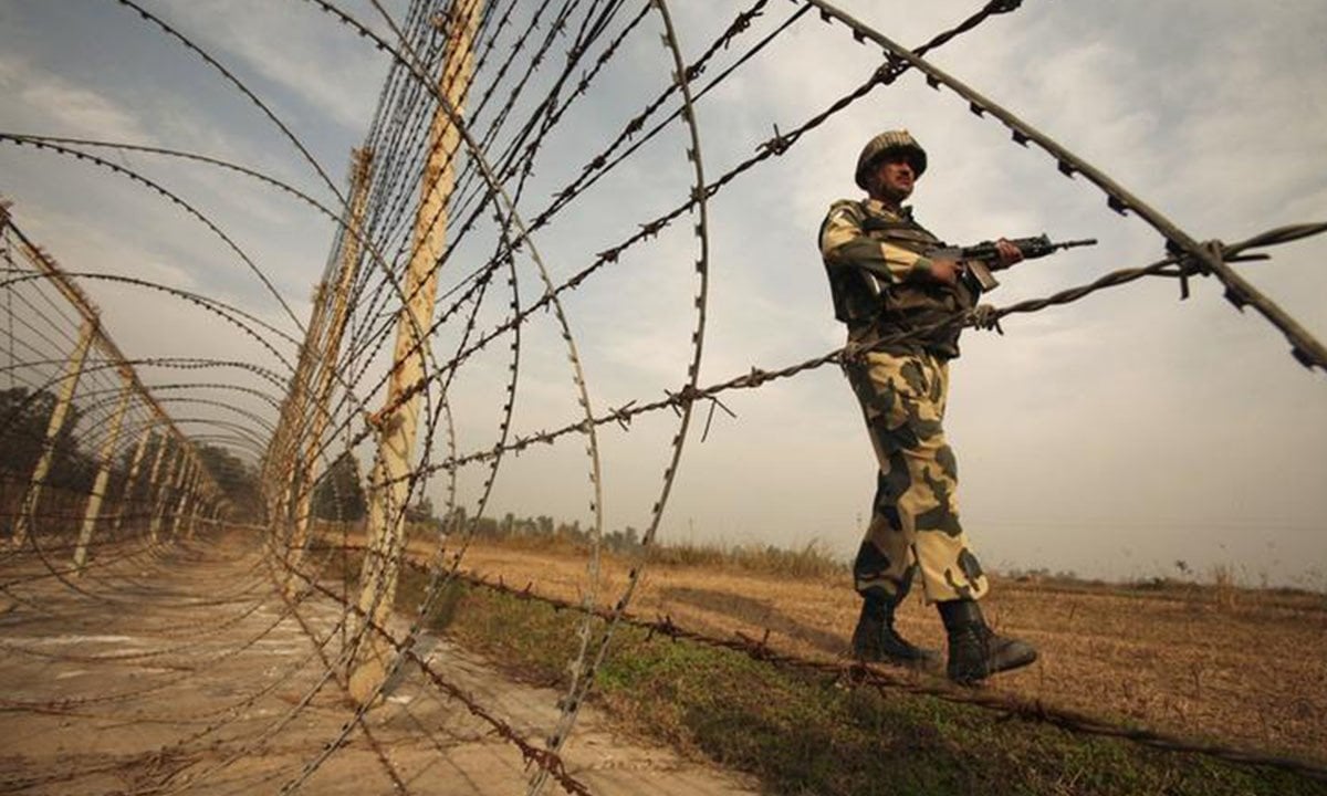 a soldier patrols the pakistan india border photo reuters