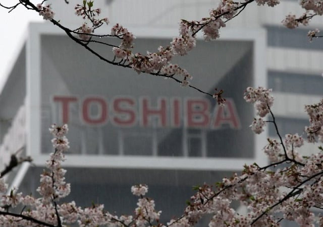 the logo of toshiba is seen behind cherry blossoms at the company 039 s headquarters in tokyo japan april 11 2017 photo reuters the logo of toshiba is seen behind cherry blossoms at the company 039 s headquarters in tokyo japan april 11 2017 photo reuters
