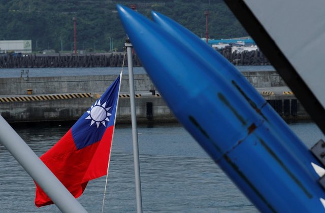 china has been issuing increasingly strident calls for taiwan to toe the line photo reuters