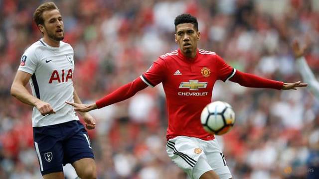 manchester united 039 s chris smalling in action with tottenham 039 s harry kane photo reuters