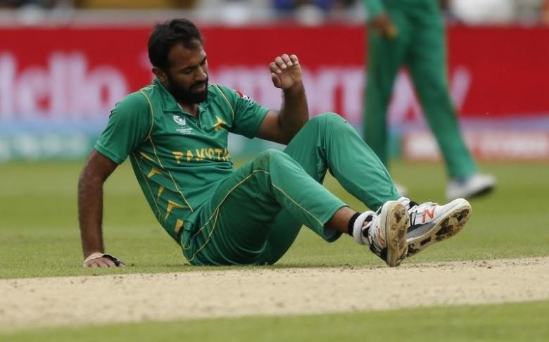 wahab riaz lies injured photo reuters