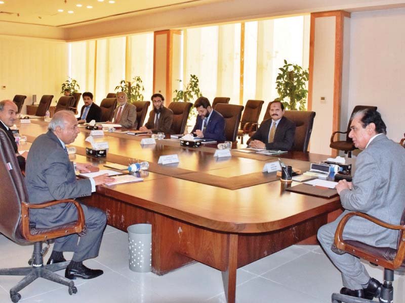 nab chief javed iqbal chairs a meeting at the bureau s headquarters photo express