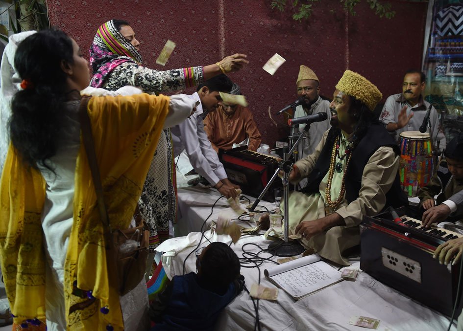 in this photograph taken on january 19 2018 qawwali singer talha sabri c performs with his group during an event in karachi photo afp