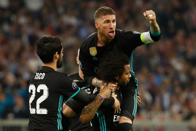 real madrid 039 s brazilian defender marcelo c celebrates scoring with his team mates real madrid 039 s spanish midfielder isco l and real madrid 039 s spanish defender sergio ramos during the uefa champions league semi final first leg football match fc bayern munich v real madrid cf in munich southern germany on april 25 2018 photo afp