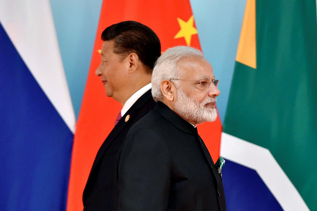 pm narendra modi is flying to the chinese city of wuhan for two days of talks with president xi jinping photo reuters