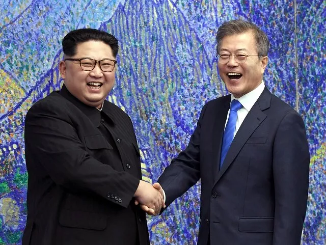 south korea 039 s president moon jae in r shakes hands with north korea 039 s leader kim jong un l during the inter korean summit in the peace house building on the southern side of the truce village of panmunjom on april 27 2018 north korean leader kim jong un and the south 039 s president moon jae in sat down to a historic summit on april 27 after shaking hands over the military demarcation line that divides their countries in a gesture laden with symbolism photo afp south korea 039 s president moon jae in r shakes hands with north korea 039 s leader kim jong un l during the inter korean summit in the peace house building on the southern side of the truce village of panmunjom on april 27 2018 north korean leader kim jong un and the south 039 s president moon jae in sat down to a historic summit on april 27 after shaking hands over the military demarcation line that divides their countries in a gesture laden with symbolism photo afp