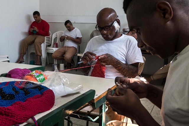 quot crocheting helps us reduce our anxiety and to make time go by quot bezerra said photo afp