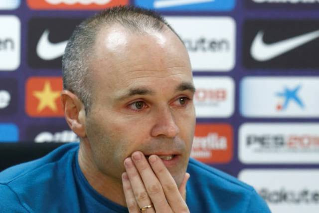 a tearful andres iniesta has announced he is leaving barcelona after 22 years associated with the club photo afp a tearful andres iniesta has announced he is leaving barcelona after 22 years associated with the club photo afp