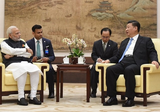 this handout photograph released by india 039 s ministry of external affairs on april 27 2018 shows india 039 s prime minister narendra modi l meeting with chinese president xi jinping in wuhan photo afp this handout photograph released by india 039 s ministry of external affairs on april 27 2018 shows india 039 s prime minister narendra modi l meeting with chinese president xi jinping in wuhan photo afp