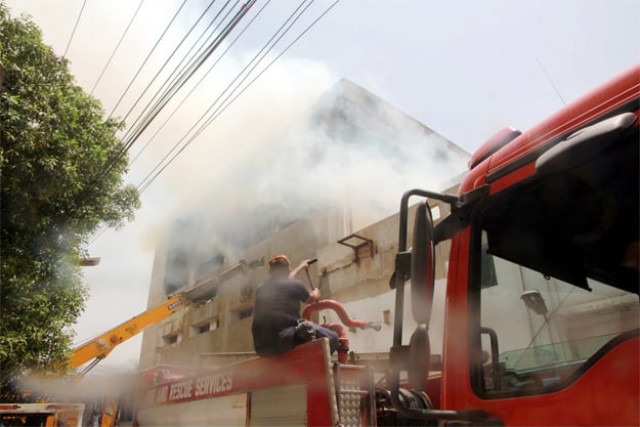 efforts continued on friday to put out flames at lucky textile mills photo ppi efforts continued on friday to put out flames at lucky textile mills photo ppi