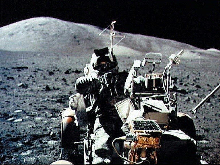 a nasa picture taken by us crew commander eugene a cernan during the apollo 17 mission on december 13 1972 shows astronaut and geologist harrison h schmitt seated in the lunar roving vehicle on the surface of the moon photo afp