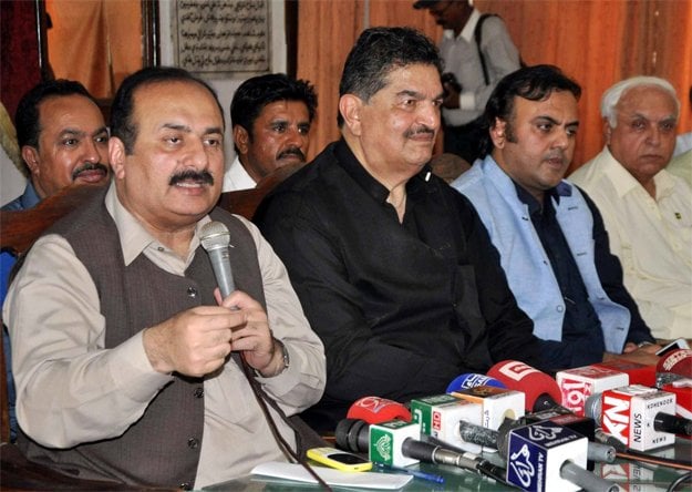 punjab education minister rana mashhood who was the election committee head addressing a press conference at the hyderabad press club photo ppi