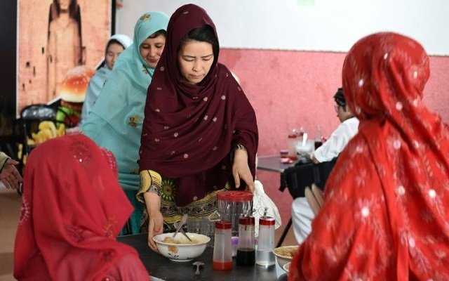 hameeda ali hazara c who is from pakistan 039 s shia ethnic minority hazara community runs the quot hazara quot restaurant    a project that aims to help to help families and female victims of sectarian attacks photo afp