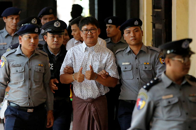 the 32 year old myanmar journalist and his colleague kyaw soe oo 28 have been detained since they were arrested in december photo reuters