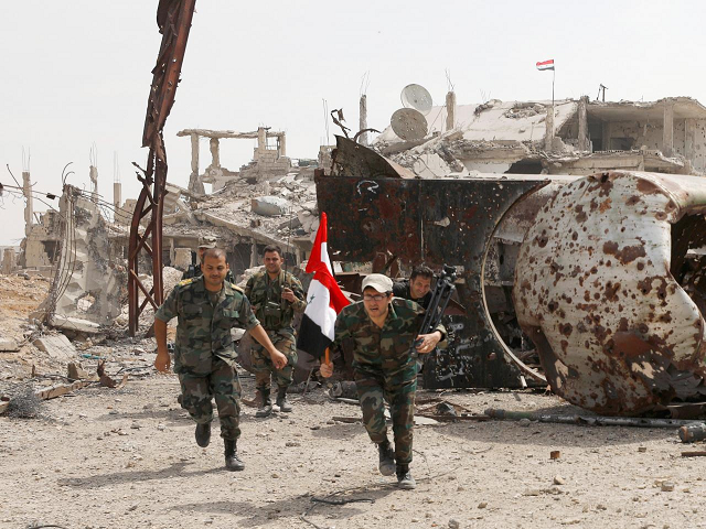 the syrian army s assault on the pocket between homs and hama included both air strikes and artillery photo reuters the syrian army s assault on the pocket between homs and hama included both air strikes and artillery photo reuters