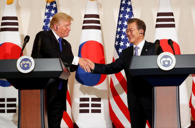 us president donald trump and south korea s president moon jae in shake hands during a news conference at south korea s presidential blue house in seoul south korea photo reuters us president donald trump and south korea s president moon jae in shake hands during a news conference at south korea s presidential blue house in seoul south korea photo reuters