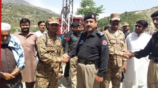 army hands over akhagran check post to k p police photo express army hands over akhagran check post to k p police photo express