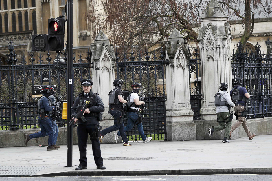 Armed police respond outside Parliament during the incident. PHOTO: REUTERS