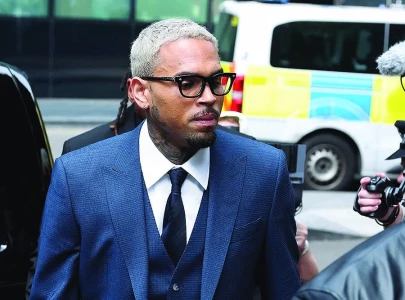 chris brown pleads not guilty