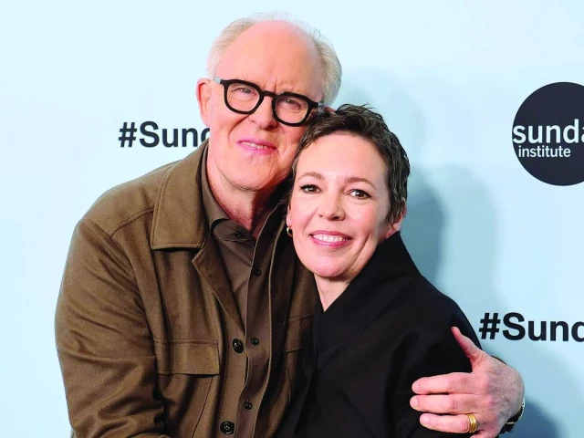 john lithgow and olivia colman began the proceedings photo file john lithgow and olivia colman began the proceedings photo file