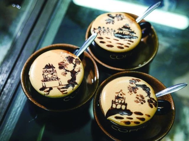 vietnamese egg coffee with foam featuring patterns of hanoi s landmarks photo dw vietnamese egg coffee with foam featuring patterns of hanoi s landmarks photo dw