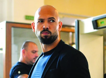 us women s group calls for andrew tate s extradition after florida arrival us women s group calls for andrew tate s extradition after florida arrival