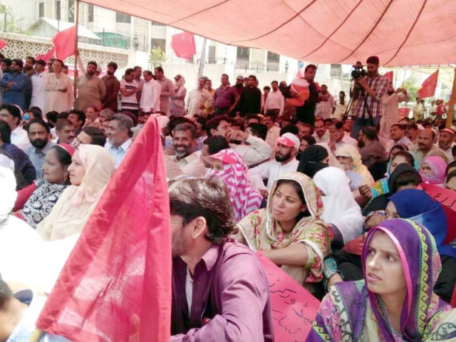 a large number of people participate in a rally in the city photo express a large number of people participate in a rally in the city photo express