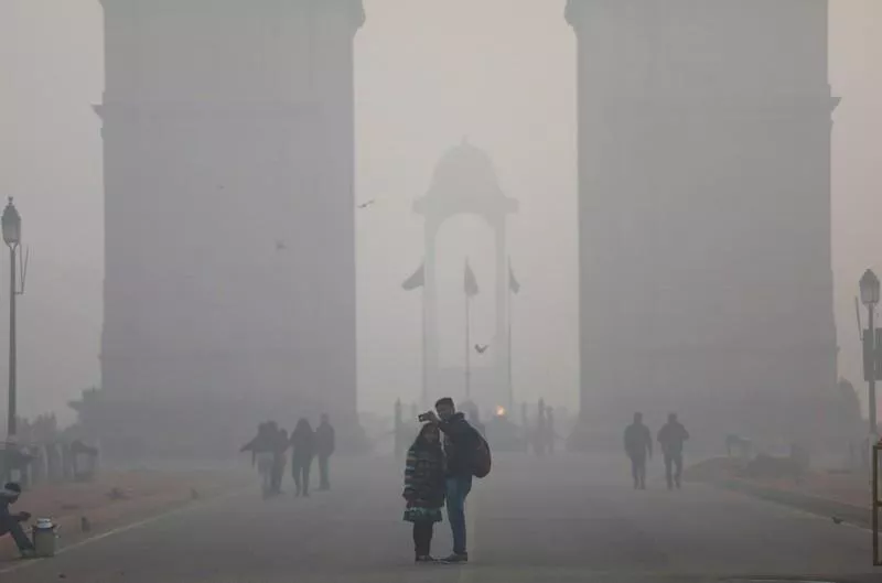 people take a selfie in front of the india gate war memorial on a smoggy winter morning in new delhi india december 26 2017 photo reuters people take a selfie in front of the india gate war memorial on a smoggy winter morning in new delhi india december 26 2017 photo reuters