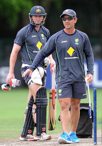 justin langer r was appointed on thursday as the head coach of all three formats for australia photo afp