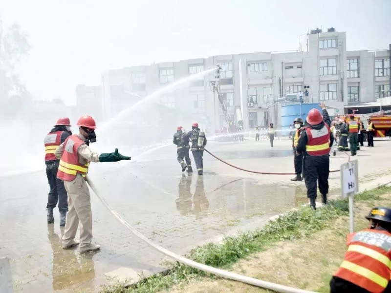 rescue 1122 personnel take part in a mock exercise in sialkot on the occasion of international firefighters day photo ppi rescue 1122 personnel take part in a mock exercise in sialkot on the occasion of international firefighters day photo ppi