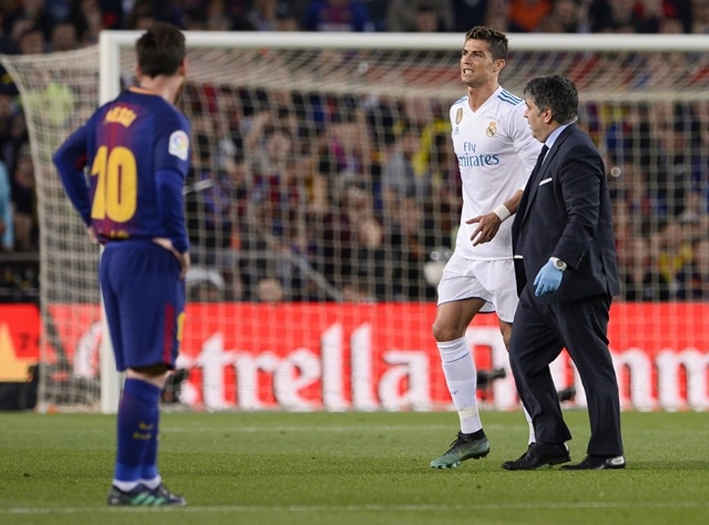 sweating over his fitness cristiano ronaldo was substituted after feeling a knock to his ankle during the clasico clash against barcelona with a 2 2 draw at the camp nou photo afp