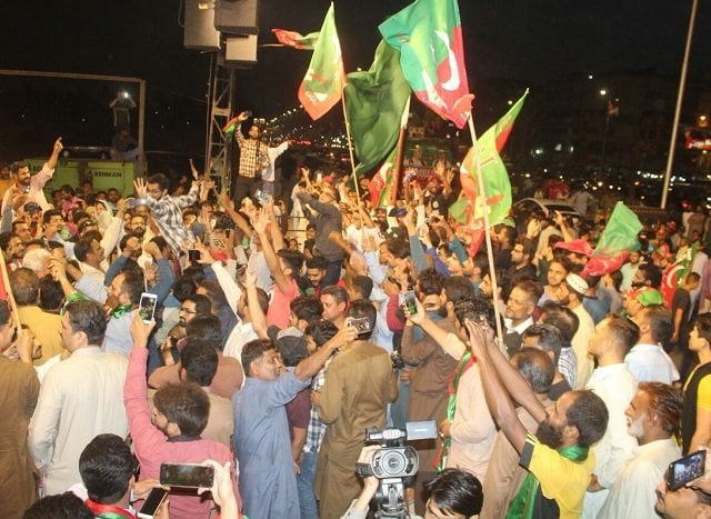 pti supporters at urdu university ground on university road photo pti official pti supporters at urdu university ground on university road photo pti official