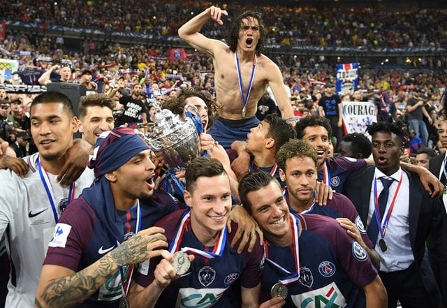 paris saint germain 039 s players celebrate with the trophy at the end of the french cup final football match between les herbiers and paris saint germain psg on may 8 2018 at the stade de france in saint denis outside paris photo afp