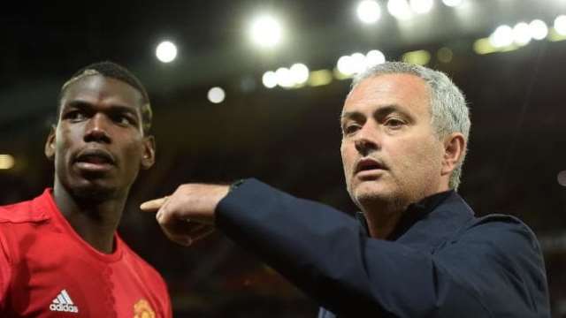 paul pogba and jose mourinho during a recent manchester united match photo afp