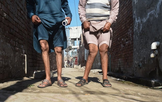in this picture taken on february 25 2018 pakistani residents basharat ali l and naveed show their deformed lags allegedly caused by environmental factors and polluted groundwater in kot assadullah around 45km from lahore plastic chemical pharmaceutical and wire manufacturing factories in kot assadullah are widely blamed for contaminating the water local residents are forced to drink according to the lahore chamber of commerce and industries 90 percent of factories in and around the city dump their waste without treating it photo afp in this picture taken on february 25 2018 pakistani residents basharat ali l and naveed show their deformed lags allegedly caused by environmental factors and polluted groundwater in kot assadullah around 45km from lahore plastic chemical pharmaceutical and wire manufacturing factories in kot assadullah are widely blamed for contaminating the water local residents are forced to drink according to the lahore chamber of commerce and industries 90 percent of factories in and around the city dump their waste without treating it photo afp