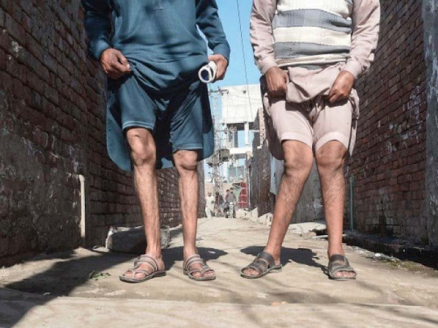 two residents show their deformed legs photo afp two residents show their deformed legs photo afp