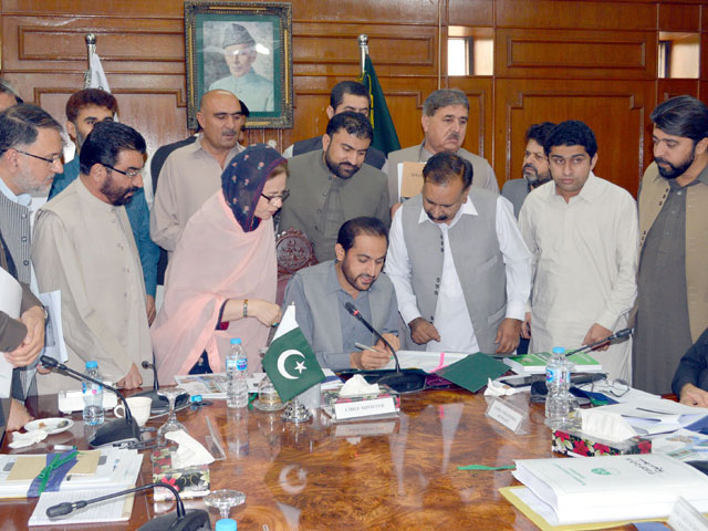 balochistan chief minister abdul quddus bizenjo signing the budget document during the provincial cabinet s meeting photo express