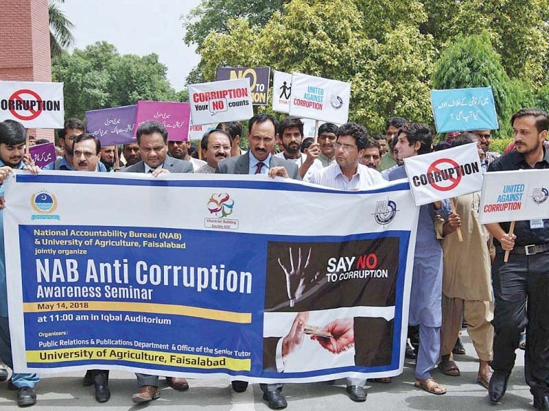 nab deputy director and uaf vc dr iqbal zafar lead an anti corruption awareness walk on monday photo app