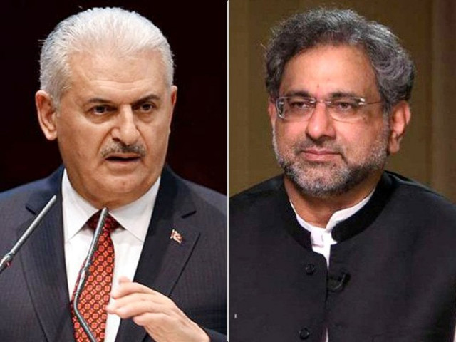 turkish prime minister binali yildirim and prime minister shahid khaqan abbasi photo file turkish prime minister binali yildirim and prime minister shahid khaqan abbasi photo file