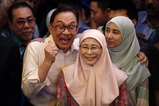 anwar ibrahim rejoicing with his family after being released from prison photo reuters