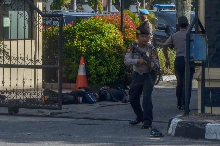 police patrol the streets of indonesia photo afp