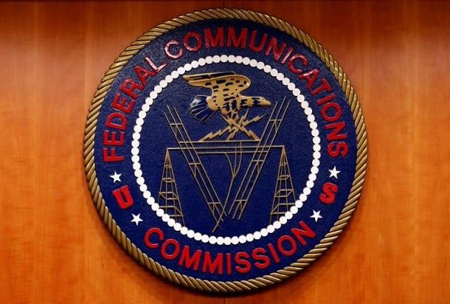 the federal communications commission fcc logo is seen before the fcc net neutrality hearing in washington us february 26 2015 photo reuters