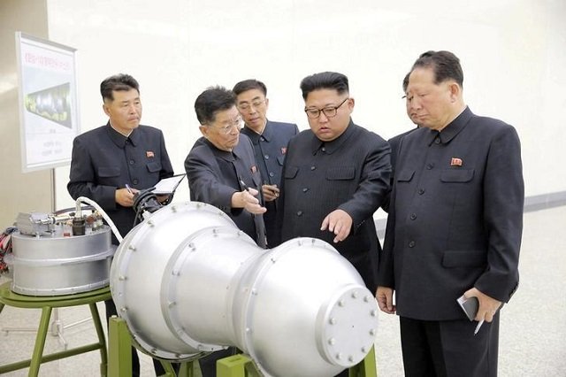 file photo north korean leader kim jong un provides guidance with ri hong sop 2nd l and hong sung mu r on a nuclear weapons program in this undated photo released by north korea 039 s korean central news agency kcna in pyongyang on september 3 2017 photo via reuters