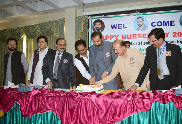 balochistan chief minister abdul quddus bizenjo cuts a cake to celebrate nurses day in quetta photo express balochistan chief minister abdul quddus bizenjo cuts a cake to celebrate nurses day in quetta photo express